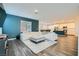 Inviting living space showcasing a comfortable white sectional sofa and open-concept design at 290 Mount Tyndall St, Henderson, NV 89015