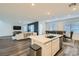 Inviting living space showcasing a comfortable white sectional sofa and open-concept design at 290 Mount Tyndall St, Henderson, NV 89015
