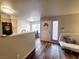 Inviting open-concept living area with wood flooring, neutral walls, and ample natural light at 3083 Casey Dr # 101, Las Vegas, NV 89120
