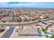 Stunning aerial view of a vibrant community with well-maintained homes and a private backyard pool at 314 Meadow Brush Pl, Henderson, NV 89011