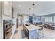 Open kitchen with an island, stainless appliances, with eat-in dining area at 314 Meadow Brush Pl, Henderson, NV 89011