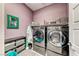 Laundry room featuring modern washer and dryer on display at 314 Meadow Brush Pl, Henderson, NV 89011