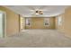 Spacious bedroom with ample natural light, complemented by neutral walls and carpeting at 3189 Sisley Garden Ave, Henderson, NV 89044