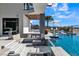 Backyard featuring a pool, seating area, and fire pit at 3266 S Spring Mountain Blvd, Pahrump, NV 89048