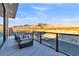 Outdoor balcony with comfortable seating and spectacular mountain views at 3266 S Spring Mountain Blvd, Pahrump, NV 89048