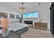 Stylish bedroom featuring a fireplace, chandelier and scenic views at 3266 S Spring Mountain Blvd, Pahrump, NV 89048