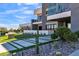 Modern home with stylish desert landscaping and walkway at 3266 S Spring Mountain Blvd, Pahrump, NV 89048