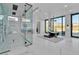 Modern main bathroom features a glass shower, a soaking tub, and mountain views at 3266 S Spring Mountain Blvd, Pahrump, NV 89048