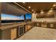 Outdoor kitchen equipped with stainless steel appliances at 3266 S Spring Mountain Blvd, Pahrump, NV 89048