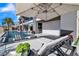 Luxury backyard with lounge chairs, umbrella, and pool with clear blue water at 3266 S Spring Mountain Blvd, Pahrump, NV 89048