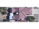 Aerial view of the property, highlighting the roof, landscaping, and surrounding neighborhood at 3831 Flickering Star Dr, Las Vegas, NV 89103