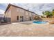 Spacious backyard with a sparkling pool and spa, perfect for outdoor entertaining at 4372 Melrose Abbey Pl, Las Vegas, NV 89141