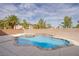 Beautiful backyard pool and spa surrounded by mature trees at 4372 Melrose Abbey Pl, Las Vegas, NV 89141