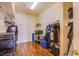 Functional walk-in closet with shelving, hanging rods, and room for storage containers at 4372 Melrose Abbey Pl, Las Vegas, NV 89141