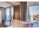 Luxurious bathroom featuring a freestanding tub with city views and modern fixtures at 4381 W Flamingo Rd # 3002, Las Vegas, NV 89103