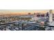 Scenic city view from a balcony, showcasing the vibrant city skyline at sunset at 4381 W Flamingo Rd # 3002, Las Vegas, NV 89103