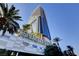 Tall building exterior showing many stories with the building's name at the top and bottom at 4381 W Flamingo Rd # 3002, Las Vegas, NV 89103