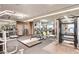Well-equipped gym featuring weightlifting stations and mirrored walls at 4381 W Flamingo Rd # 3002, Las Vegas, NV 89103