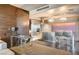 Stylish living area featuring a modern kitchen with island seating and a sleek desk area at 4381 W Flamingo Rd # 3002, Las Vegas, NV 89103