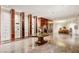 A grand lobby featuring stylish decor and ample seating with elegant display cases at 4381 W Flamingo Rd # 3002, Las Vegas, NV 89103