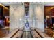 Upscale lobby with luxe seating, mirrored accents, and stone wall design elements at 4381 W Flamingo Rd # 3002, Las Vegas, NV 89103