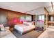 Comfortable main bedroom with a large bed, mirrored wall, and modern decor at 4381 W Flamingo Rd # 3002, Las Vegas, NV 89103