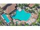 Overhead view of a resort-style swimming pool with lounge areas, palm trees, and well-maintained facilities at 508 Via Palermo Dr, Henderson, NV 89011
