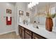 Bathroom featuring dual vanities with modern fixtures, and decor for a luxurious feel at 508 Via Palermo Dr, Henderson, NV 89011