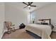 Bedroom with neutral colors and a comfortable chair at 508 Via Palermo Dr, Henderson, NV 89011