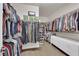 Spacious walk-in closet with built-in shelving and racks for ample storage at 508 Via Palermo Dr, Henderson, NV 89011