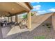 This covered patio features comfortable seating, ceiling fans, and a decorative brick border at 508 Via Palermo Dr, Henderson, NV 89011