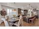 Gourmet kitchen featuring a central island with bar seating, stainless steel appliances, and designer finishes at 508 Via Palermo Dr, Henderson, NV 89011