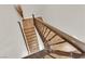Staircase with decorative metal railing and wood steps leading to the next level at 508 Via Palermo Dr, Henderson, NV 89011