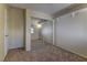 The carpeted bedroom features ample storage space with a mirrored closet at 5345 Silvermist Ct # 203, Las Vegas, NV 89122