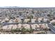 This aerial view shows a Nevada neighborhood with desert landscaping at 5784 Dew Mist Ln, Las Vegas, NV 89110