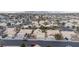 Nevada neighborhood with desert landscaping and tile roofs at 5784 Dew Mist Ln, Las Vegas, NV 89110
