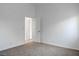 Bright bedroom featuring neutral carpet and ample natural light at 5784 Dew Mist Ln, Las Vegas, NV 89110