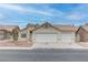 Charming single-story home with a two-car garage and well-maintained front yard at 5784 Dew Mist Ln, Las Vegas, NV 89110