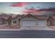 Home exterior with a two-car garage at 5784 Dew Mist Ln, Las Vegas, NV 89110