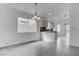 Open-concept kitchen with a breakfast bar and tile floors at 5784 Dew Mist Ln, Las Vegas, NV 89110