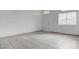 Bright living room with tile floors, a front door and plenty of space at 5784 Dew Mist Ln, Las Vegas, NV 89110