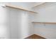Walk-in closet features built-in shelving for organized storage at 5784 Dew Mist Ln, Las Vegas, NV 89110