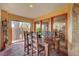 Charming dining room featuring unique stucco walls, tile floors, and ample natural light at 5785 N Tee Pee Ln, Las Vegas, NV 89149