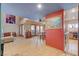 Inviting entryway leads to the dining area and kitchen, featuring tile flooring and an open layout for easy flow at 5785 N Tee Pee Ln, Las Vegas, NV 89149