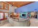 Spacious living room with dining area in the background and tile flooring at 5785 N Tee Pee Ln, Las Vegas, NV 89149
