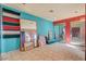 Storage room with tile floors, built-in dresser, and sliding mirror doors at 5785 N Tee Pee Ln, Las Vegas, NV 89149