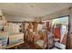 Functional storage room with ample space filled with boxes, chairs, and personal items at 5785 N Tee Pee Ln, Las Vegas, NV 89149