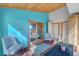 Sun room with vaulted ceiling and hardwood floors at 5785 N Tee Pee Ln, Las Vegas, NV 89149