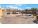 Spacious backyard features shade structure and mountain views at 6345 Strongbow Dr, Las Vegas, NV 89156
