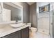 Bathroom with shower stall, modern sink and large mirror at 6345 Strongbow Dr, Las Vegas, NV 89156